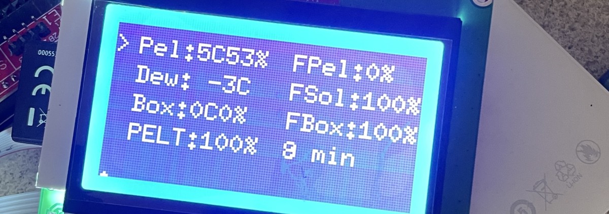 A LCD screen showing dew point calculations